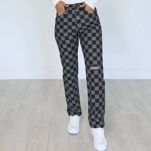 Black and Grey Checkered jeans size 27. Super cute and worn once.